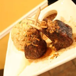 a person holding a plate of food