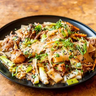 Borrocho noodles! Mai's take on drunken noodles. Saucy, sweet &amp; savory, loaded with brisket &amp; veggies.