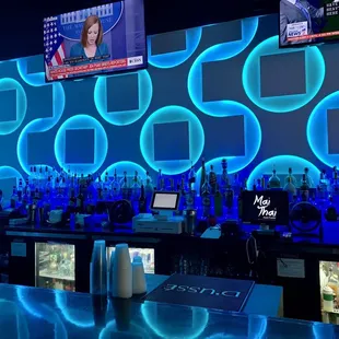 a bar with neon blue lights