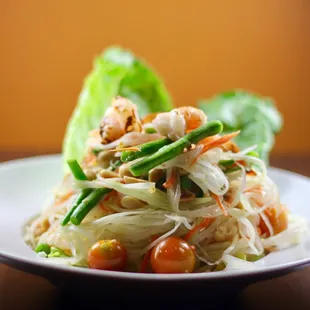 a plate of salad on a table