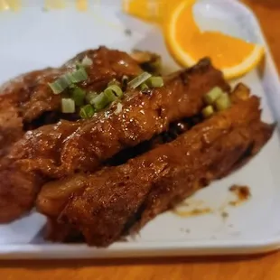 a plate of meat and vegetables