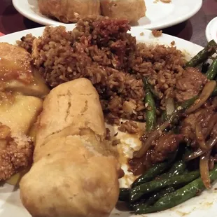 Combo meal.  Egg roll. Fried rice. Lemon chicken. Beef and green beans.  Really good!