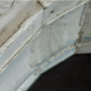 I cleaned this trim up with a wet rag.  This was what it looked like after the first time they said they were finished cleaning the house.