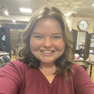 Curtain bangs, trim, golden/caramel highlights