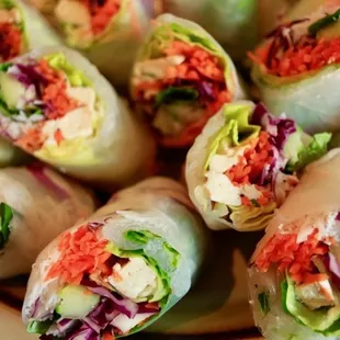 a plate of rolls with vegetables