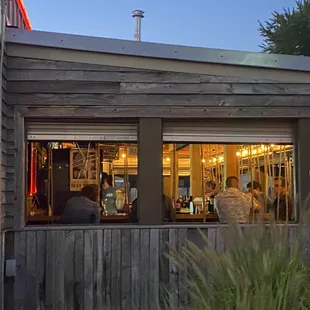 Outdoor Patio with Swings for bar seats!!