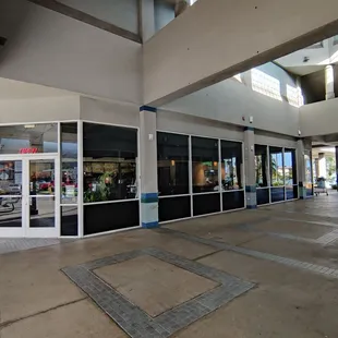 One of the end units along a strip... Great lighting from the glass windows!