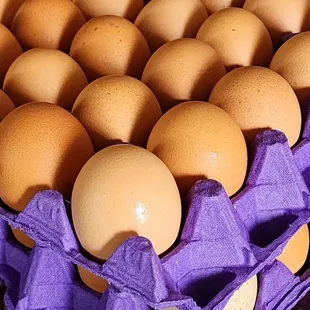 $14 per tray XL Brown eggs (tray = 2.5 dz eggs).
