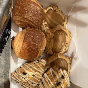 Chocolate croissants, cranberry orange scones, pear galettes.