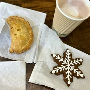 Butternut and goat cheese hand pie, gingerbread snowflake and hot chocolate