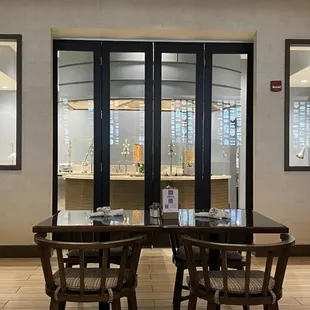 a table and chairs in a restaurant