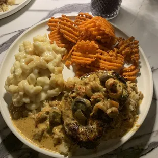 Smothered chicken with crawfish sauce