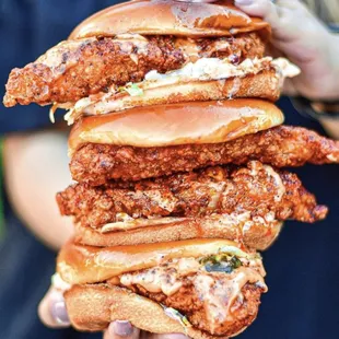 a stack of fried chicken sandwiches