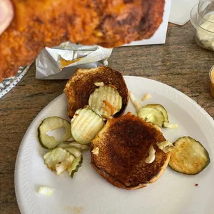 They put no slaw just plain sandwich with pickles and bits of the slaw