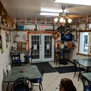 Intimate indoor seating with a variety of old country antiques. Come for the ice cream, stay for the outrageously huge menu