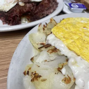 Biscuits, sausage gravy, egg, &amp; home fries special. Corned beef hash.