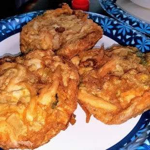 Egg Foo Young (comes with brown sauce).