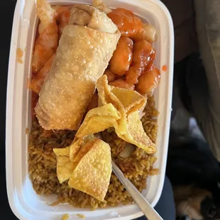 Crab Rangoon and sweet and sour chicken plate. With a pork egg roll
