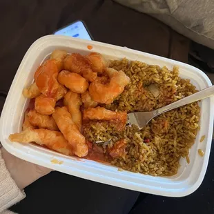 shrimp and rice in a plastic container