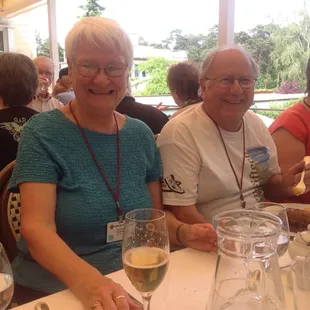 a group of people sitting at a table