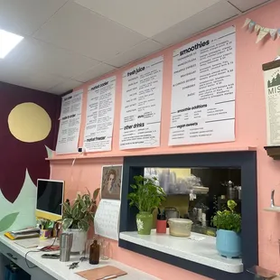 menus on the wall of a restaurant