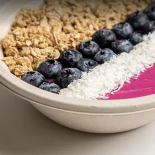 a bowl of fruit and oatmeal