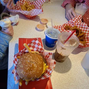 Cheeseburger meal, onion rings, peanut butter shake