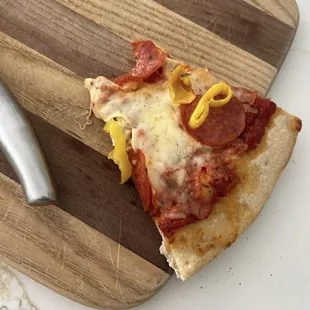 Under cooked, not fresh mozzarella. Barely any pepperoni