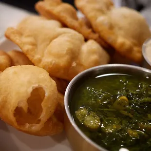 Fry bread and dips - hominy and chickpea hummus, tahini, pickled asparagus and herbs