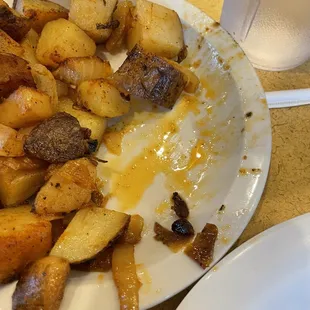 The pancakes were raw and the potatoes were extremely greasy! Service was horrible! Never go there!