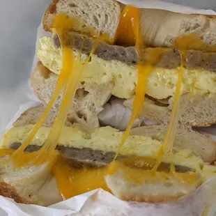Sausage, egg, and cheddar cheese on sourdough bagel. Delicious!!