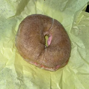 Cinnamon Crunch Bagel with strawberry cream cheese.