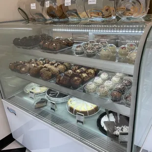 a display case full of pastries