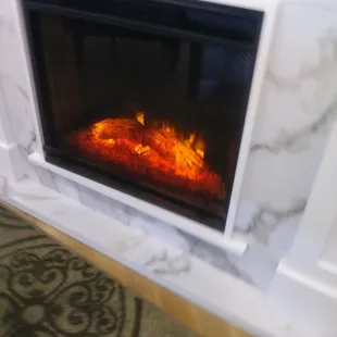 a fireplace with a fire in it