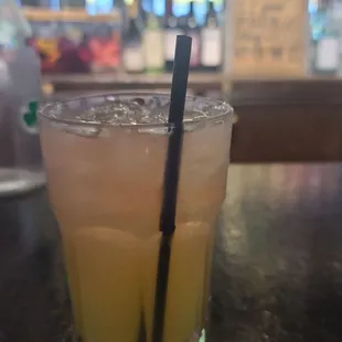 a drink in a glass with a straw
