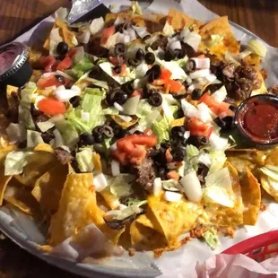 Nachos (size large -served six people/$15)