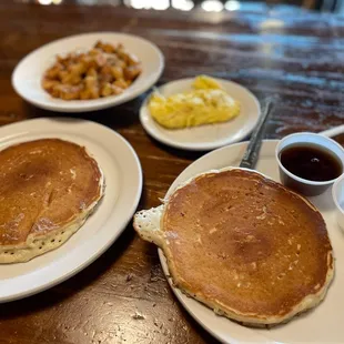 Pancakes, eggs, and breakfast potatoes