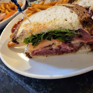 Pastrami sandwich, club sandwich with added turkey.