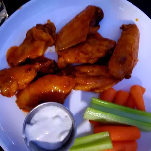 Non crispy, totally gummy skin on chicken wings. How the meat is cooked inside when the skin is not, I am not sure. Boiled?
