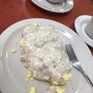 Famous biscuit with sausage gravy and scrambled eggs. DIY