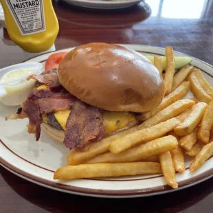 Bacon cheese burger and fries.