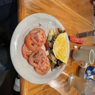 Veggie Omelet with sliced tomatoes