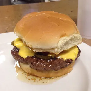 Creation burger with peanut butter,honey,jalapeños and cheese.