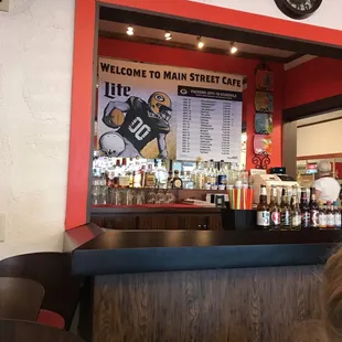 a woman sitting at the bar