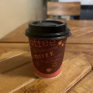 a coffee cup on a table