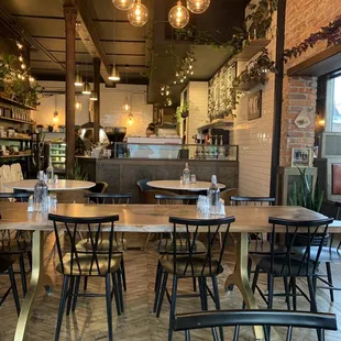 tables and chairs in a coffee shop