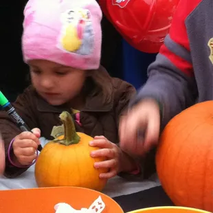 October First Friday pumpkin painting.