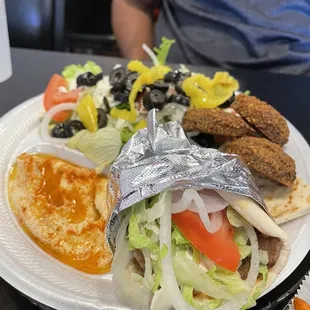 Mediterranean Platter ($10.99) beat bang for your buck! Everything was so good- includes mini gyro pita, falafel, Greek salad, hummus &amp; pita