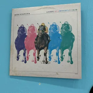 Album cover on the wall beside our table