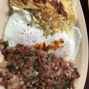 Corned Beef Hash add Grilled Jalepeno, Eggs Over Easy and Hashbrowns.